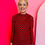 Red and black checkered long sleeve mesh top for bold, lightweight layering.