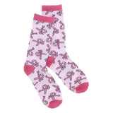 Blush pink tall crew socks with red candy canes and bows and hot pink toes, heels, and trim.