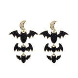 Golden crescent moon with cascade of black bat charms 
