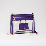 Clear crossbody bag with vibrant purple trim and gold hardware, featuring a detachable sunglasses holder—fun and functional for any event.
