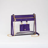 Clear crossbody bag with vibrant purple trim and gold hardware, featuring a detachable sunglasses holder—fun and functional for any event.