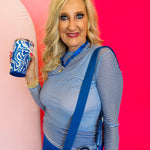 a long sleeve, crewneck mesh top with bold, horizontal stripes in vibrant blue and crisp white.