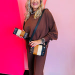 Hammitt Evan - A small, rectangular luxury leather crossbody with a camera bag style and colorblock design.