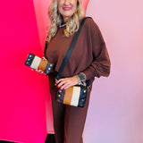 Hammitt Evan - A small, rectangular luxury leather crossbody with a camera bag style and colorblock design.
