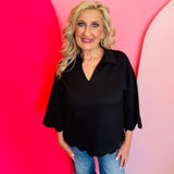 Black scalloped V-neck top with collar and 3/4 sleeves, made from soft, lightweight stretch fabric.