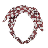 Burgundy and white checkered gameday scarf necklace, customizable with charms.