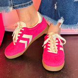 Fuchsia lace-up sneaker with suede-look upper, cream laces, and retro low-top design.