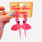Pink beaded flamingo earrings with sequins, beaded legs, and circular stud top.