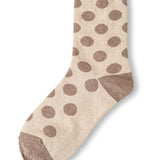 Beige polka dot socks with mocha heel and toe accents.