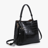 Black crocodile-textured vegan leather hobo bag with braided handle, tassels, and removable strap.