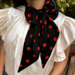 Black and red silky Latigo scarf with versatile styling options.