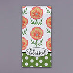 Floral tea towel with orange and yellow flowers, green accents, polka dots, and blessed script