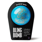 Blue bath bomb with silver topping and blueberry lemongrass scent, includes hidden surprise inside.