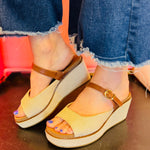 Corky's bourbon wedge sandals with textured strap and gold buckle ankle strap.