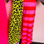 Half leopard half neon striped cropped wide-leg pants with drawstring waist and pockets.