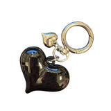 Black acrylic oversized heart charm with silver accent, perfect for scarf necklaces or trendy jewelry.
