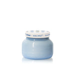 Capri Blue Volcano Caffè Petite Candle in blue ribbed glass with striped lid.