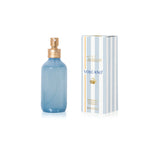 Capri Blue Volcano Caffè Room Spray in blue glass bottle with gold sprayer.