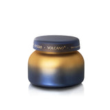 Capri Blue Volcano Tuscan Radiance candle in blue and gold ombré vessel.