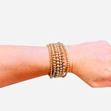 Gold bead bracelet stack set with varying sizes water resistant jewelry