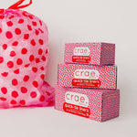 Pink trash liners with red polka dots for 8-gallon waste baskets.