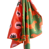 Crae Eye Of The Tiger reversible hand towel with bold green and orange animal print patterns