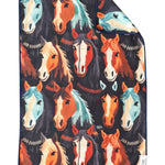Dark microfiber hand towel featuring horse print design and waffle weave texture