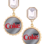 Diet Coke bottle cap earrings with gray enamel, red details, and sparkling rhinestones.