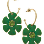 Green flower drop hoop earrings with rhinestone accents and shiny gold-tone finish.