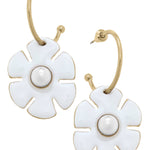 White flower drop hoop earrings with rhinestone accents and shiny gold-tone finish.