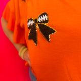 Sideline Sparkle Orange Ruffle Top