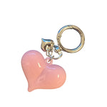 Pastel pink acrylic oversized heart charm with silver accent, perfect for scarf necklaces or trendy jewelry.