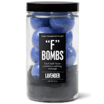 Jar of purple F Bath Bombs with lavender scent, loofah, and hidden calming messages inside.