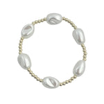 Gold filled and large pearl beaded bracelet with stretch fit and elegant design.
