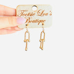 Gold linked earrings with interlocking chain design, water-resistant and lightweight for everyday wear.