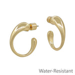Gold 1-inch textured hoop earrings with volumed design, water resistant and thicker at the top.