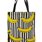 Black and white striped tote bag with banana accents and long handle.