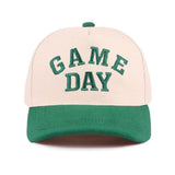 Green Game Day baseball cap with raised embroidered lettering and adjustable strap
