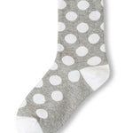 Grey polka dot socks with white heel and toe accents.
