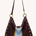 Hammitt Kyle Large Regatta Stripe handbag with multicolor leather and gold hardware.