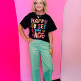 Black top with colorful Happy To See Your Face graphic and neon accents.