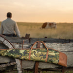 Jon Hart Rifle Cover in coated canvas with oiled leather trim and fleece lining.