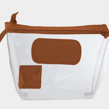 Jon Hart Airport Chico clear TSA-compliant travel pouch with bridle Natural Leather trim, flat bottom, and zippered brass closure—perfect for carrying 3oz liquids and travel essentials.