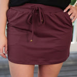 Burgundy skort with elastic waist and moisture wicking