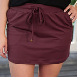 Burgundy skort with elastic waist and moisture wicking
