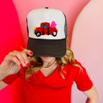 Mavis heart and truck design yarn embroidered trucker cap.
