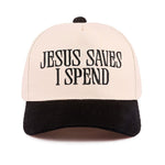Black canvas cap with black embroidered “Jesus Saves I Spend” phrase and adjustable strap.