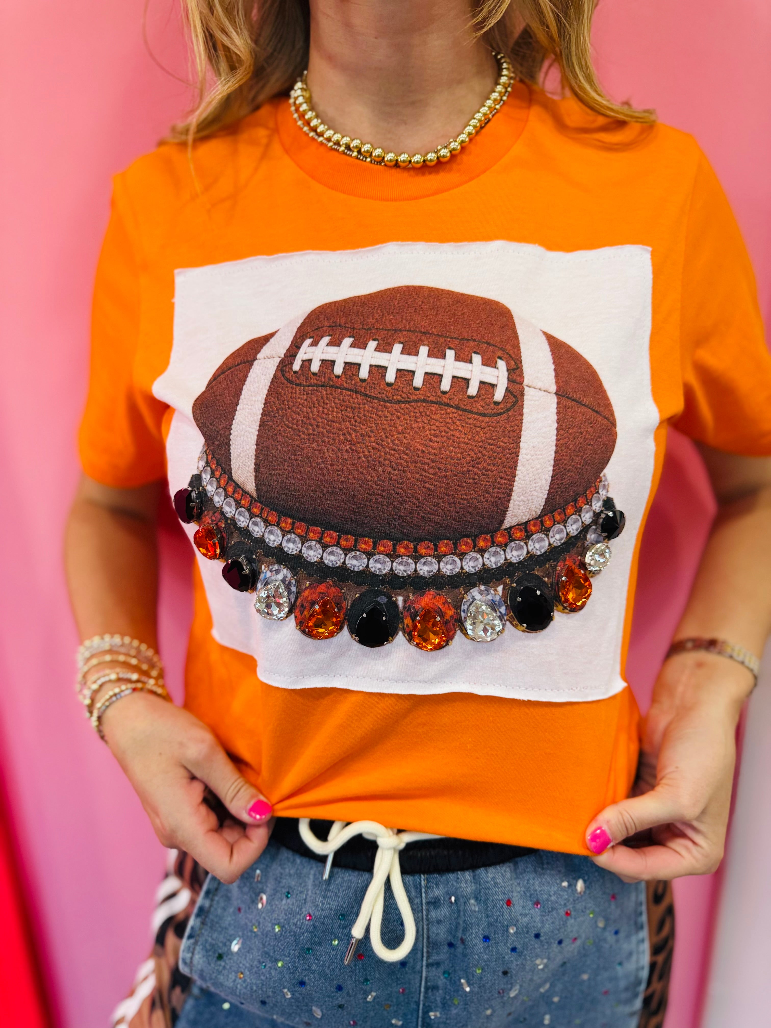 Green football tee with oversized green and clear rhinestone crystals and football patch.
