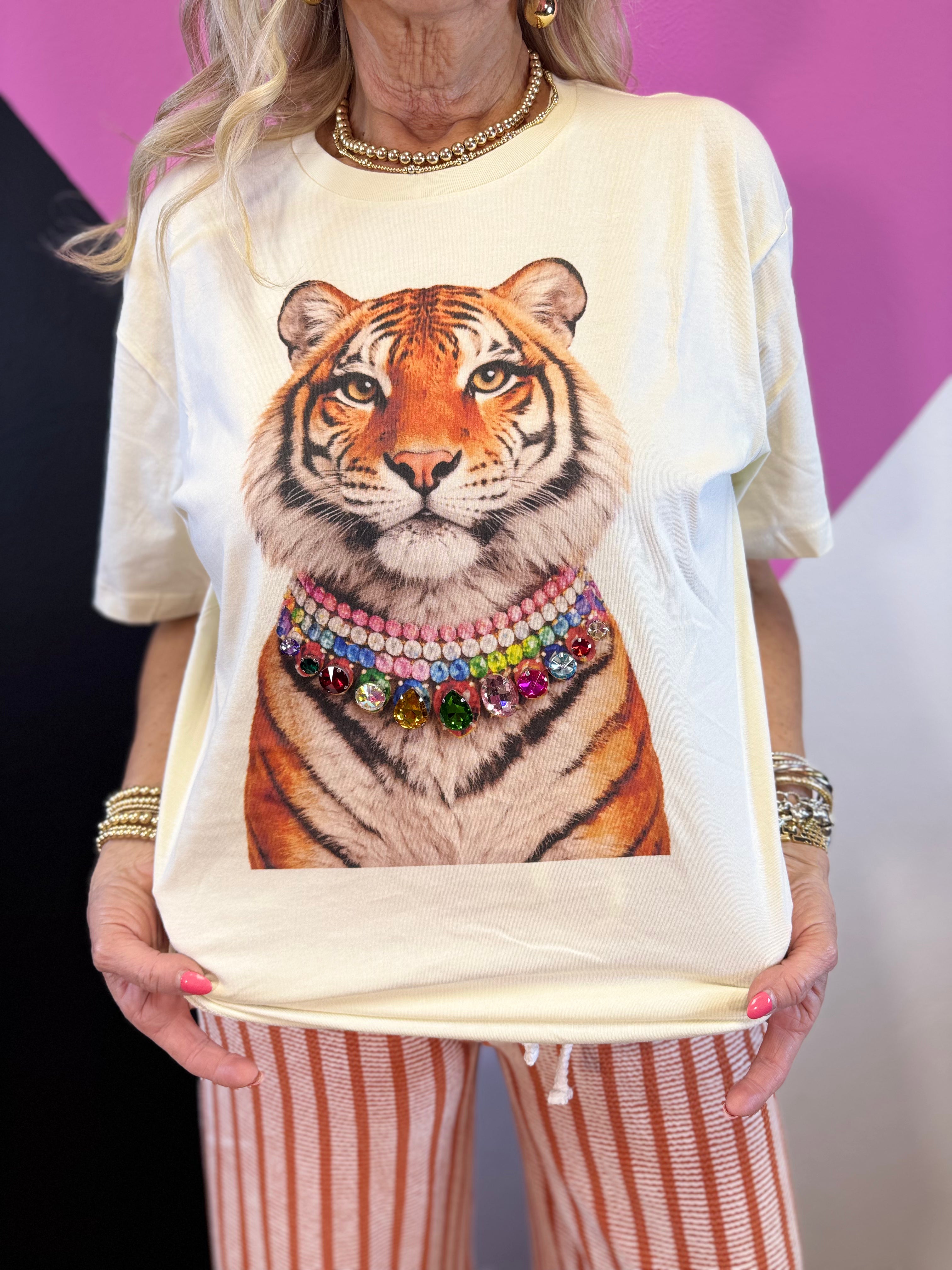 Natural tiger graphic tee with layered necklace design and sparkling multicolored jewels.