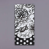 Black and white floral tea towel with polka dot border and joyful script detail